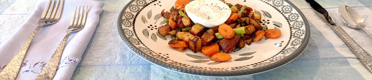 Vegetable hash served with a poached egg, a basket of freshly-baked scones, and a baked peach topped with ice cream.