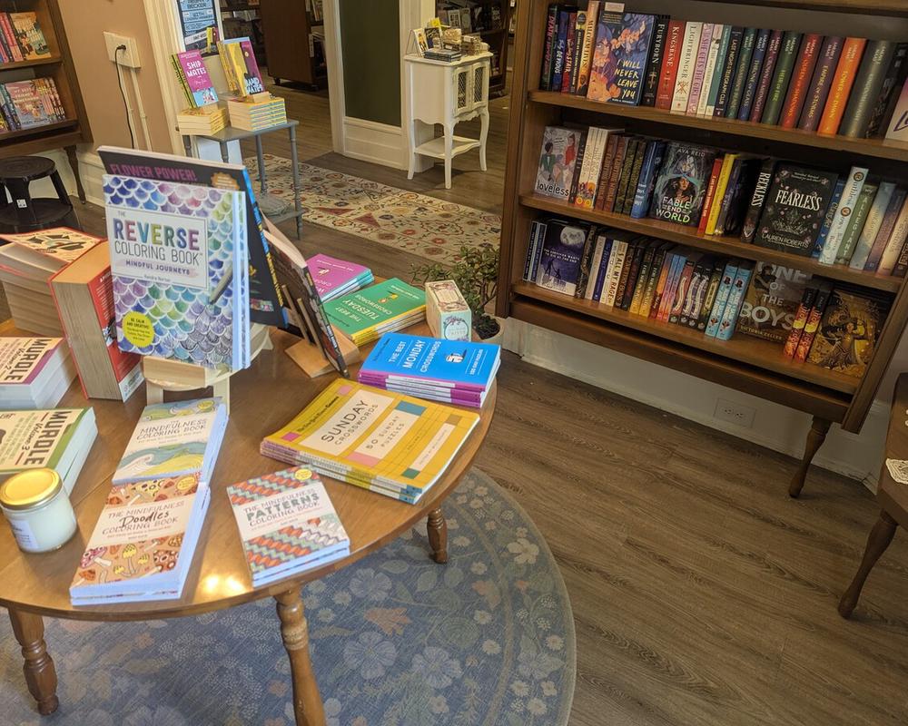 The Pocket Books Shop is cozy, comfortable, and attractively laid out.