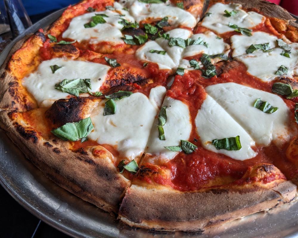 Customize your pizza with fresh mozz and your choice of other toppings.