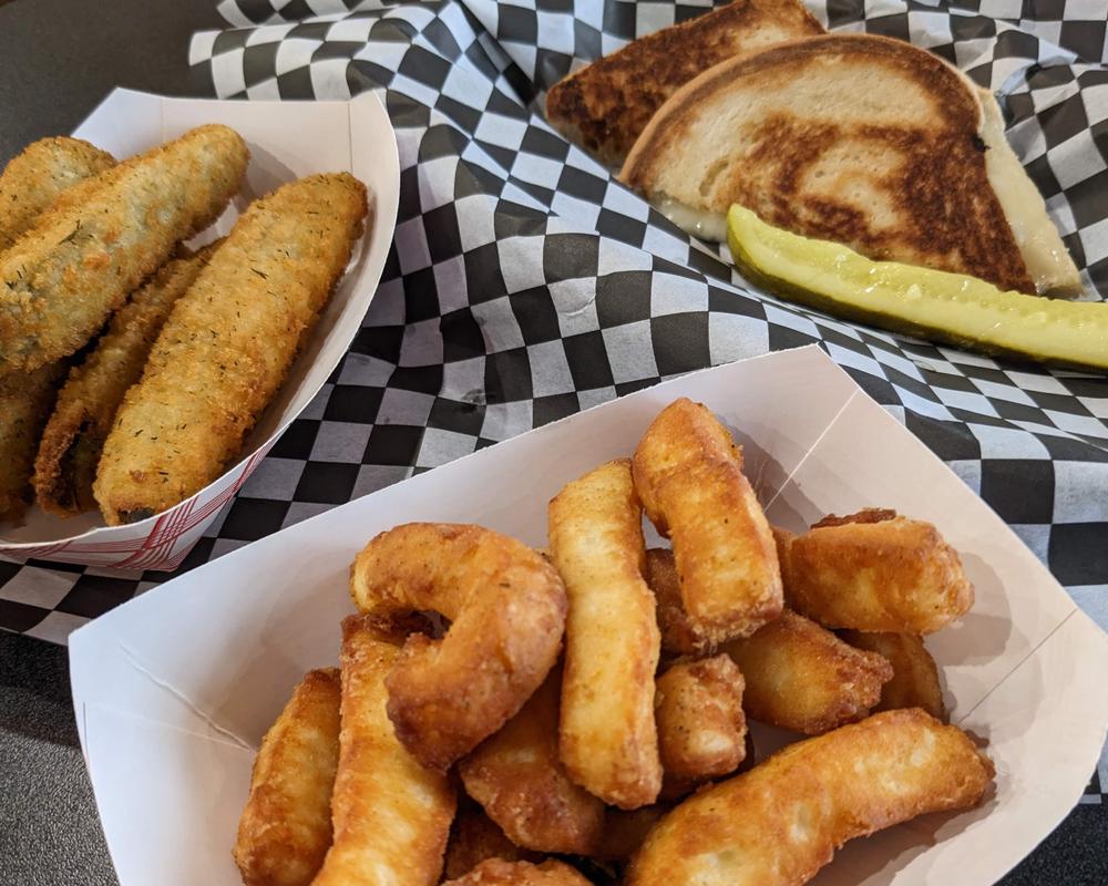 Fried pickles, fried cheese curds, and grilled cheese (with a selection of cheeses).