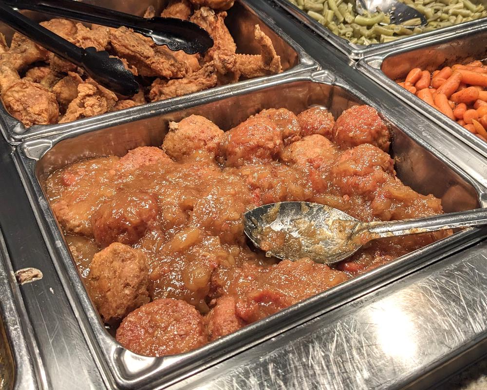 The hot bar typically includes ham balls.