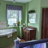 The Serenity Room has a large whirlpool tub and a private en suite bathroom with its own shower.